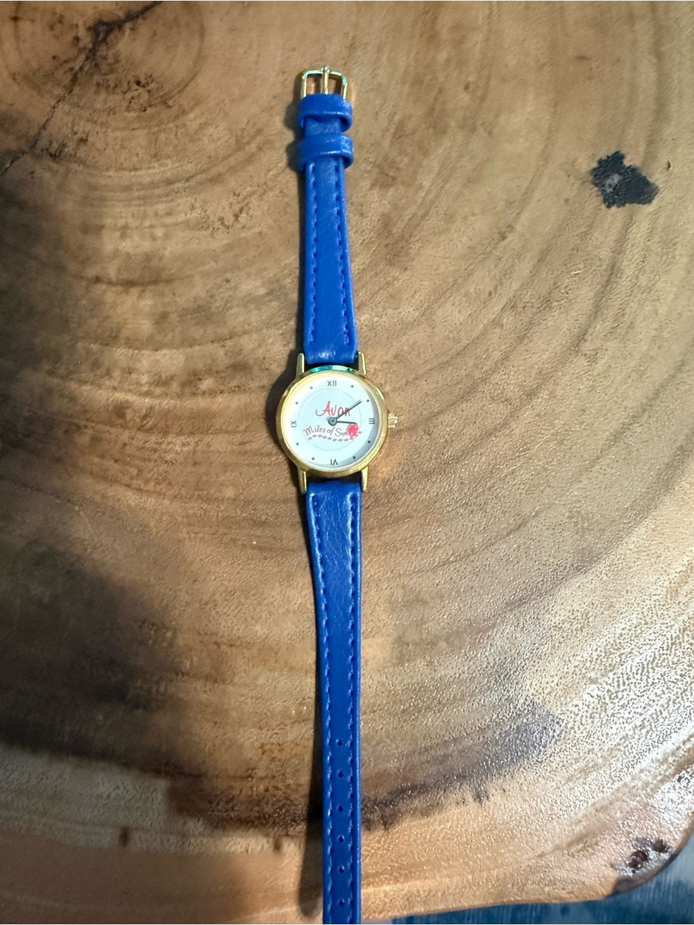 Blue Avon Watch with Gold Case